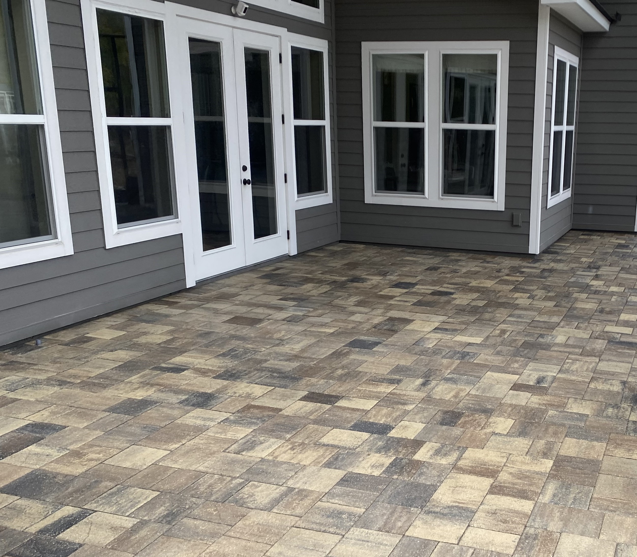 Patio and pool deck pavers after sealing in Fruit Cove