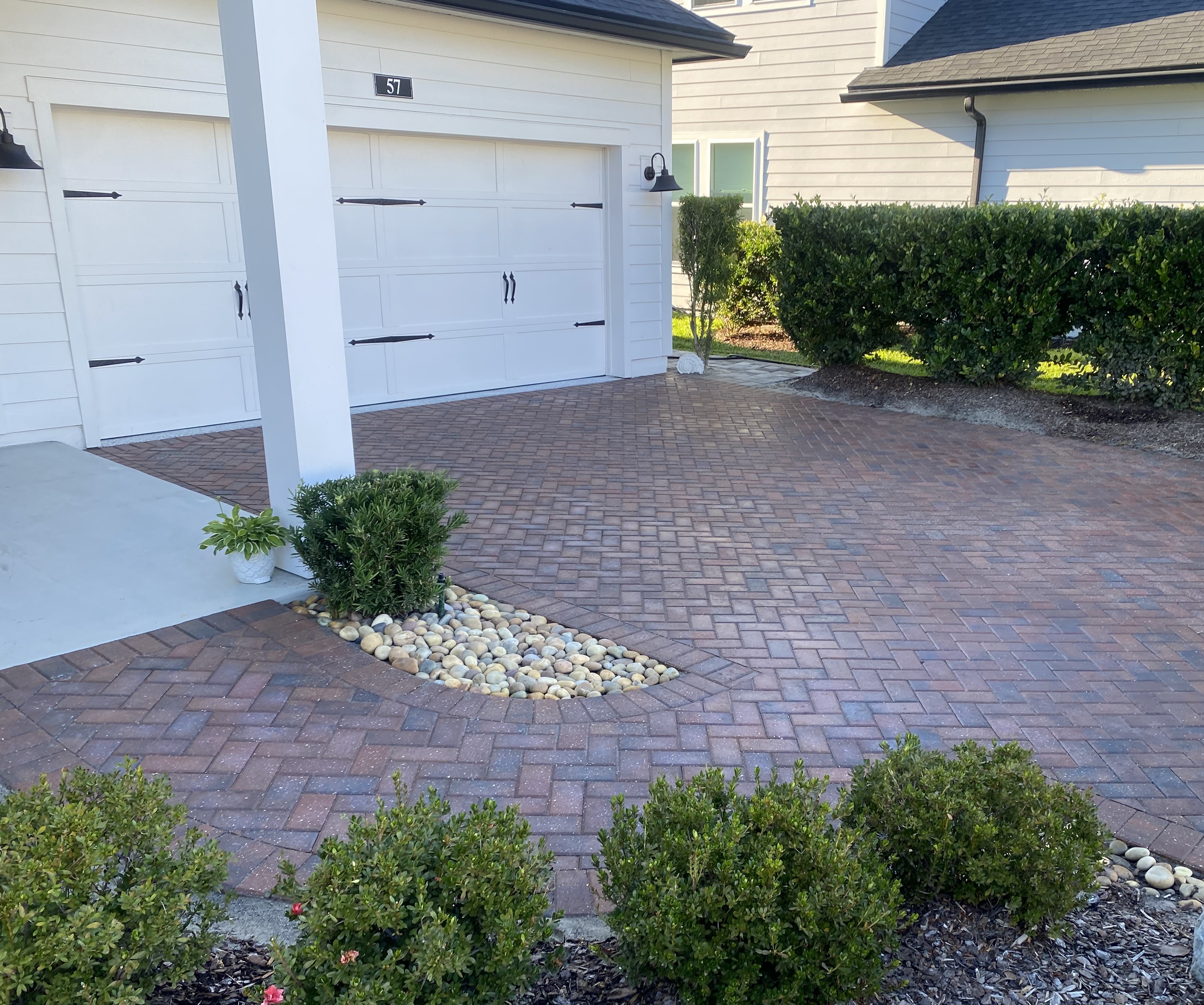 Sealed driveway and entry pavers in Crosswater