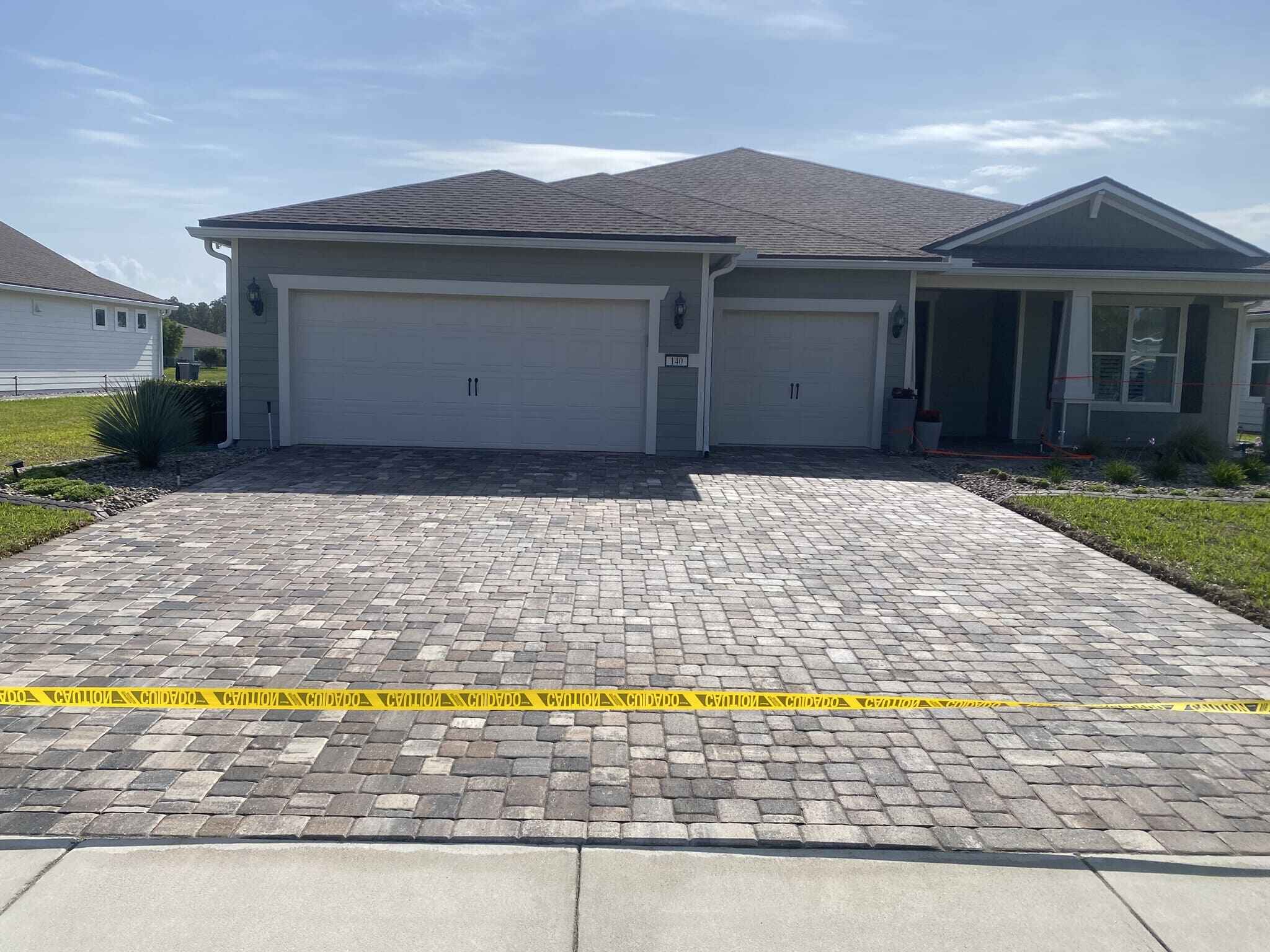 Driveway pavers restored and sealed in Del Webb Ponte Vedra