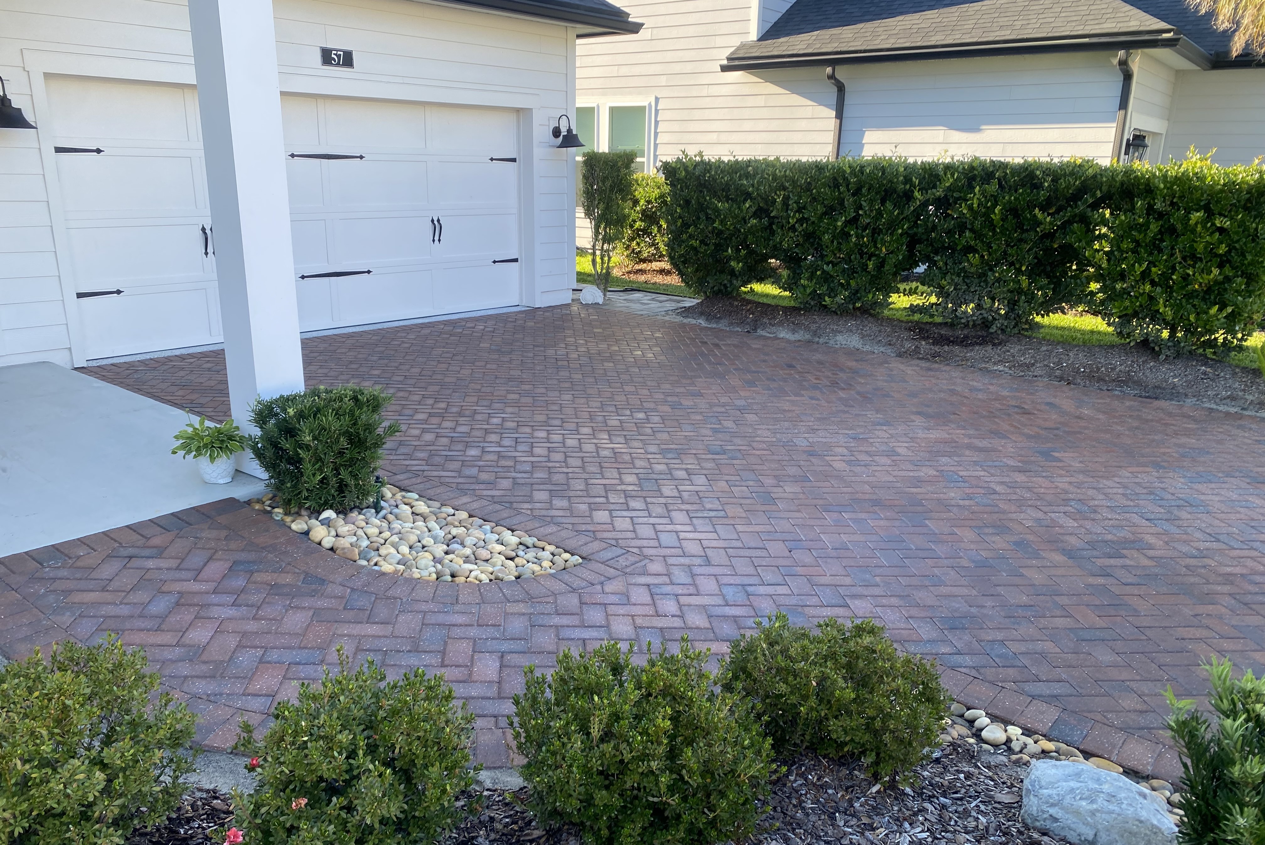 Sealed driveway and entry pavers in RiverTown