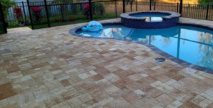 Patio and pool deck pavers after sealing in RiverTown